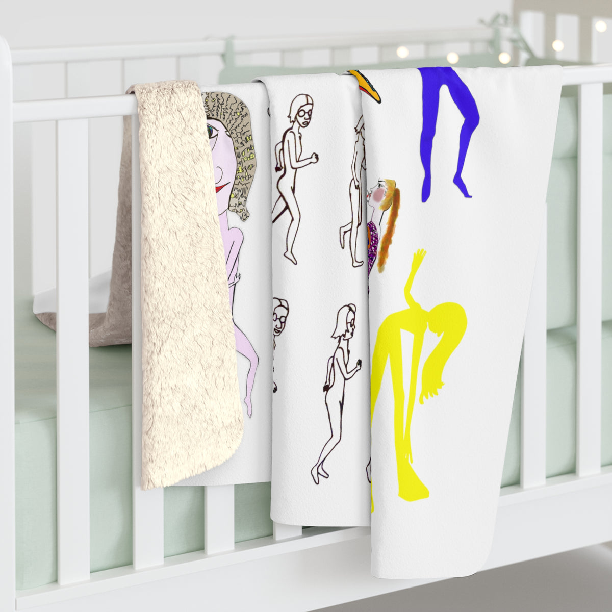 Mix character art sherpa fleece blanket hanging over a white rail showing the plush backing and illustrated front