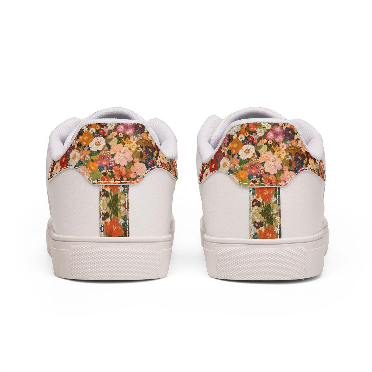 Back view of Tantrum 02 floral women’s low-top leather sneakers with colorful floral heel design