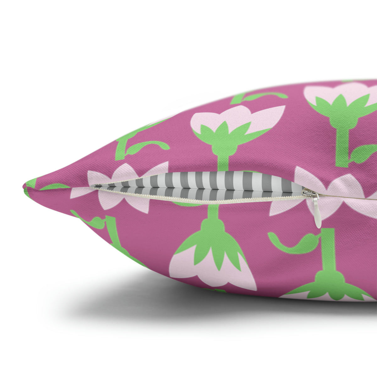 Close-up of pink tulip floral throw pillow cover showing concealed zipper detail