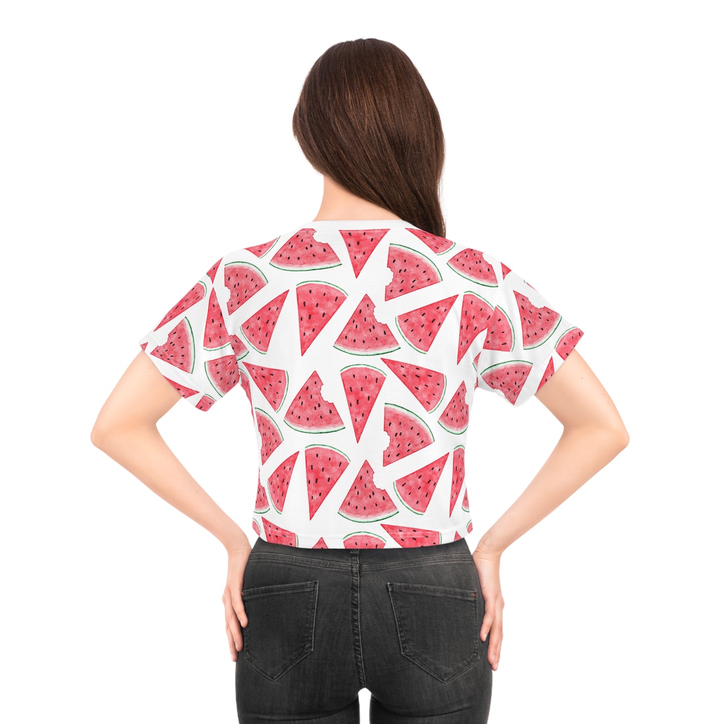 Back view of female model wearing watermelon print crop top with all-over fruit graphic pattern