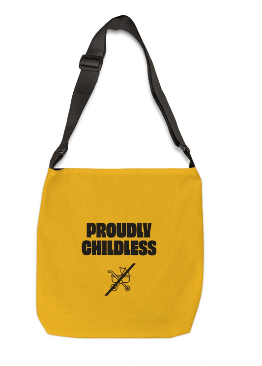 A yellow shoulder bag with a black adjustable strap, featuring bold black text that reads "PROUDLY CHILDLESS" above a crossed-out baby stroller icon.