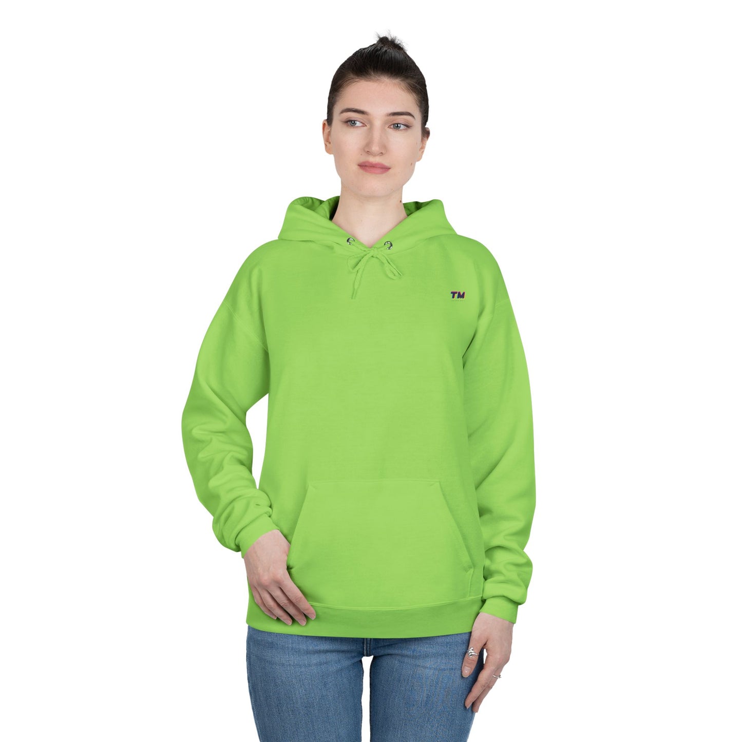 Woman wearing lime green EcoSmart hoodie with hands in pockets.