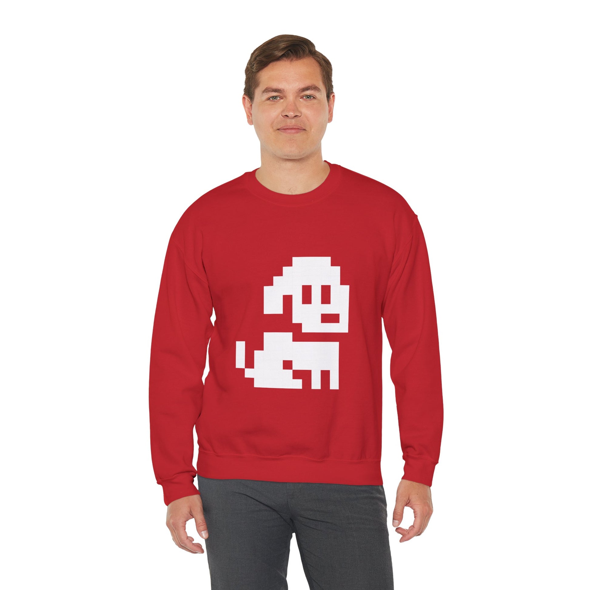 Person wearing a red sweatshirt with a white pixel dog printed
