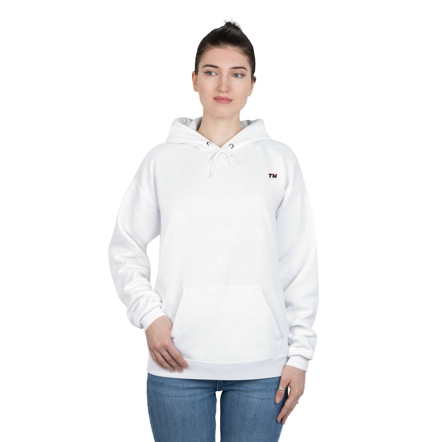 Woman wearing white EcoSmart hoodie with relaxed fit.