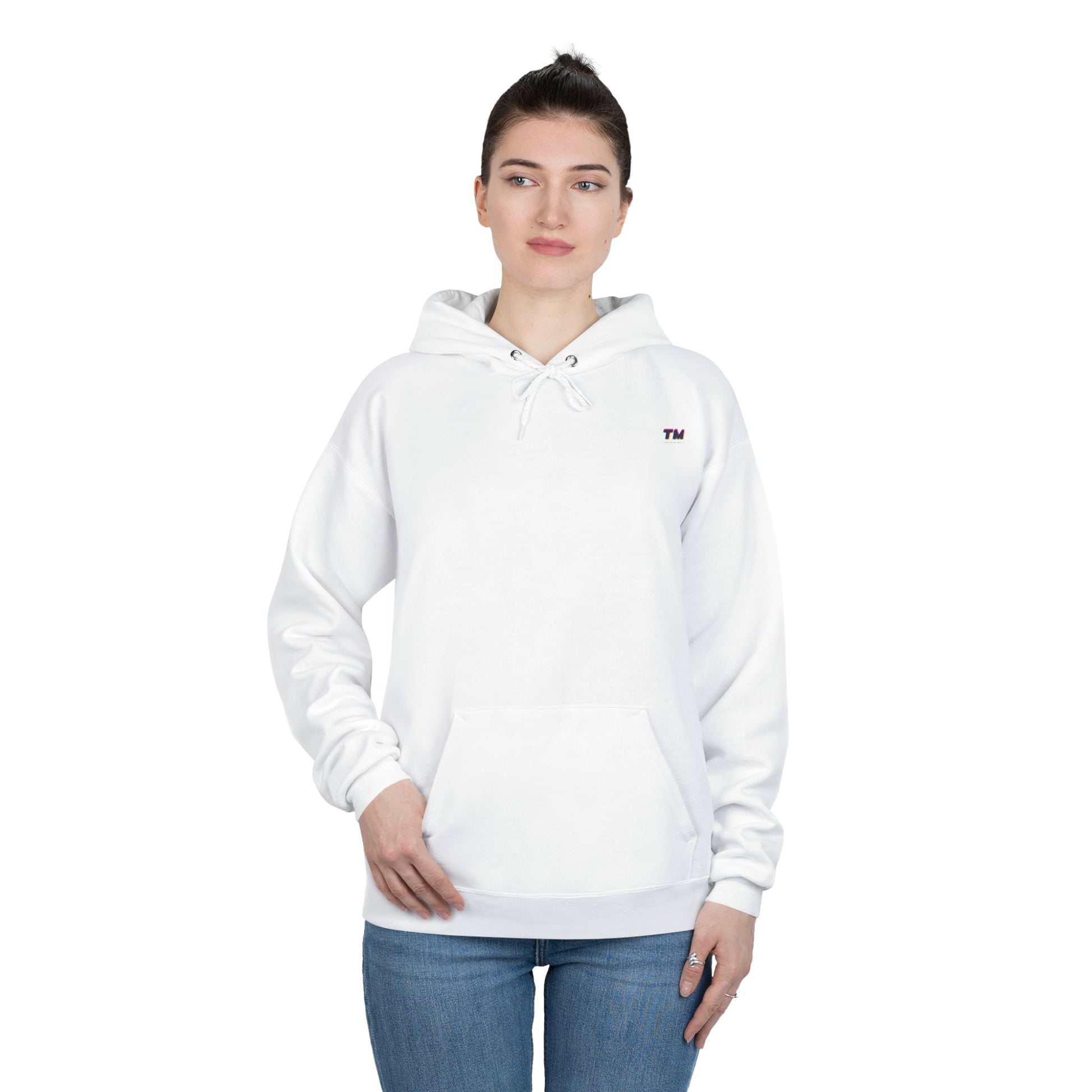 Woman wearing white EcoSmart hoodie with relaxed fit.