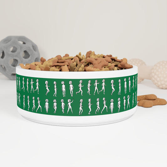 Green ceramic pet bowl filled with kibble featuring Running Out original artwork