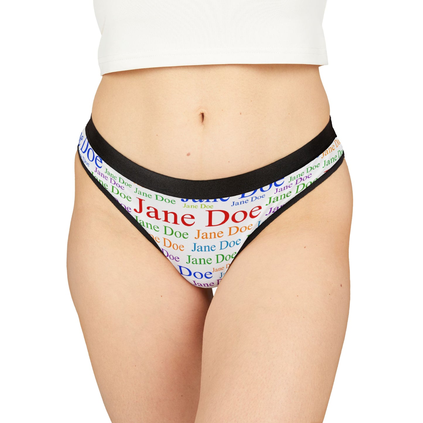 Model wearing Jane Doe Women’s Thongs – White Edition, front view