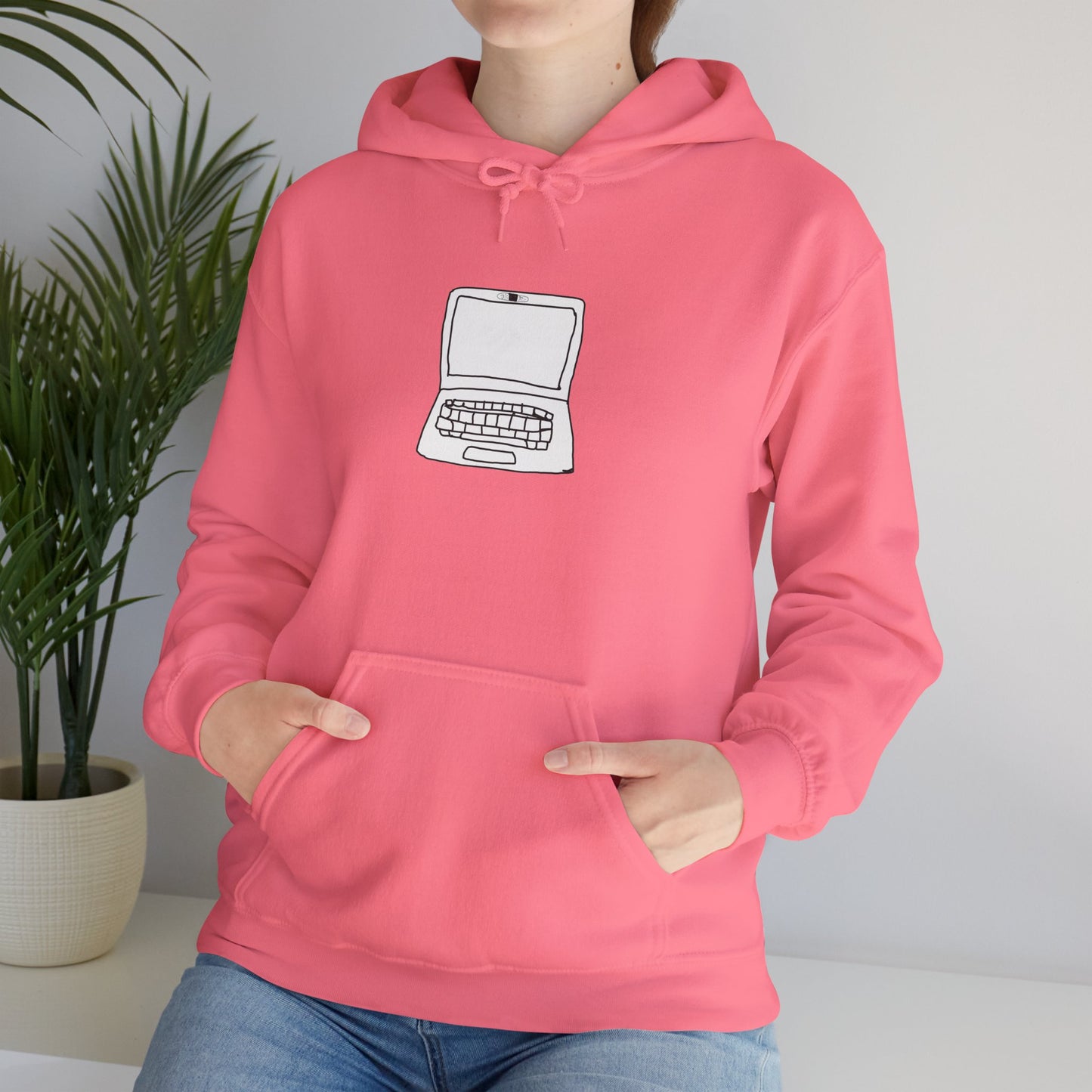 Person wearing pink Unisex Laptop No Cam Hoodie indoors
