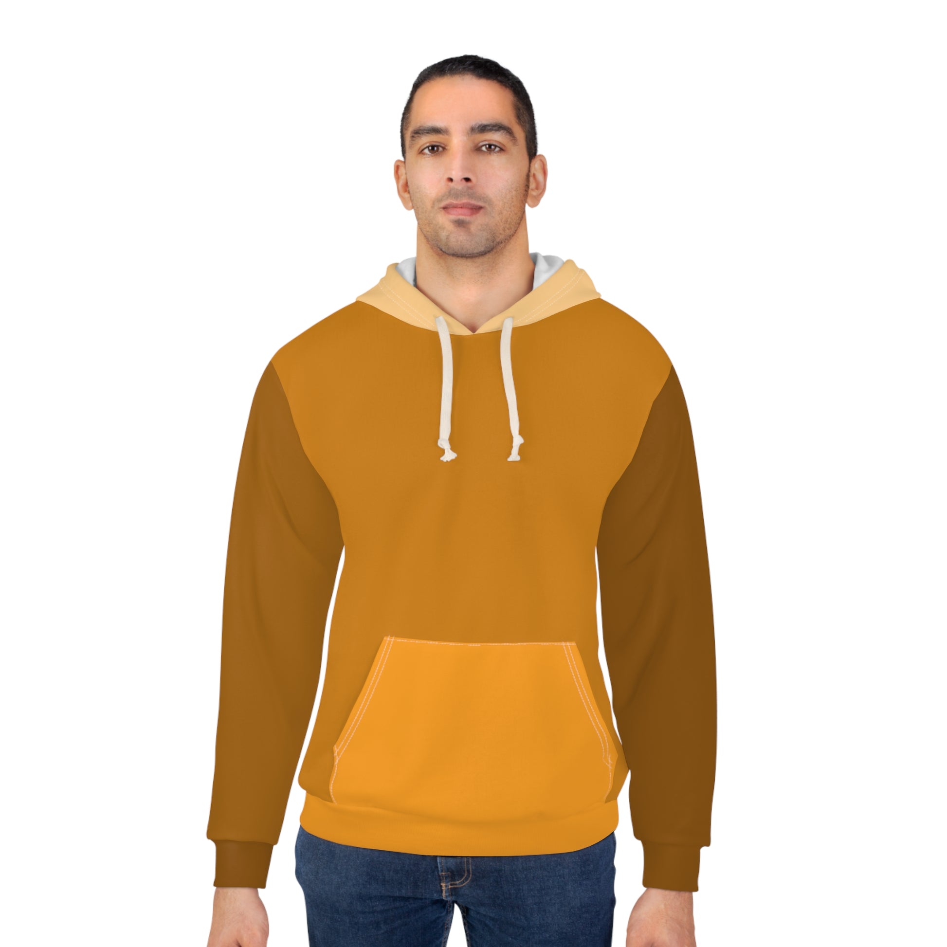 Male model wearing Cinnamon Unisex Hoodie featuring classic fit, warm brown and tan panels, and modern casual look