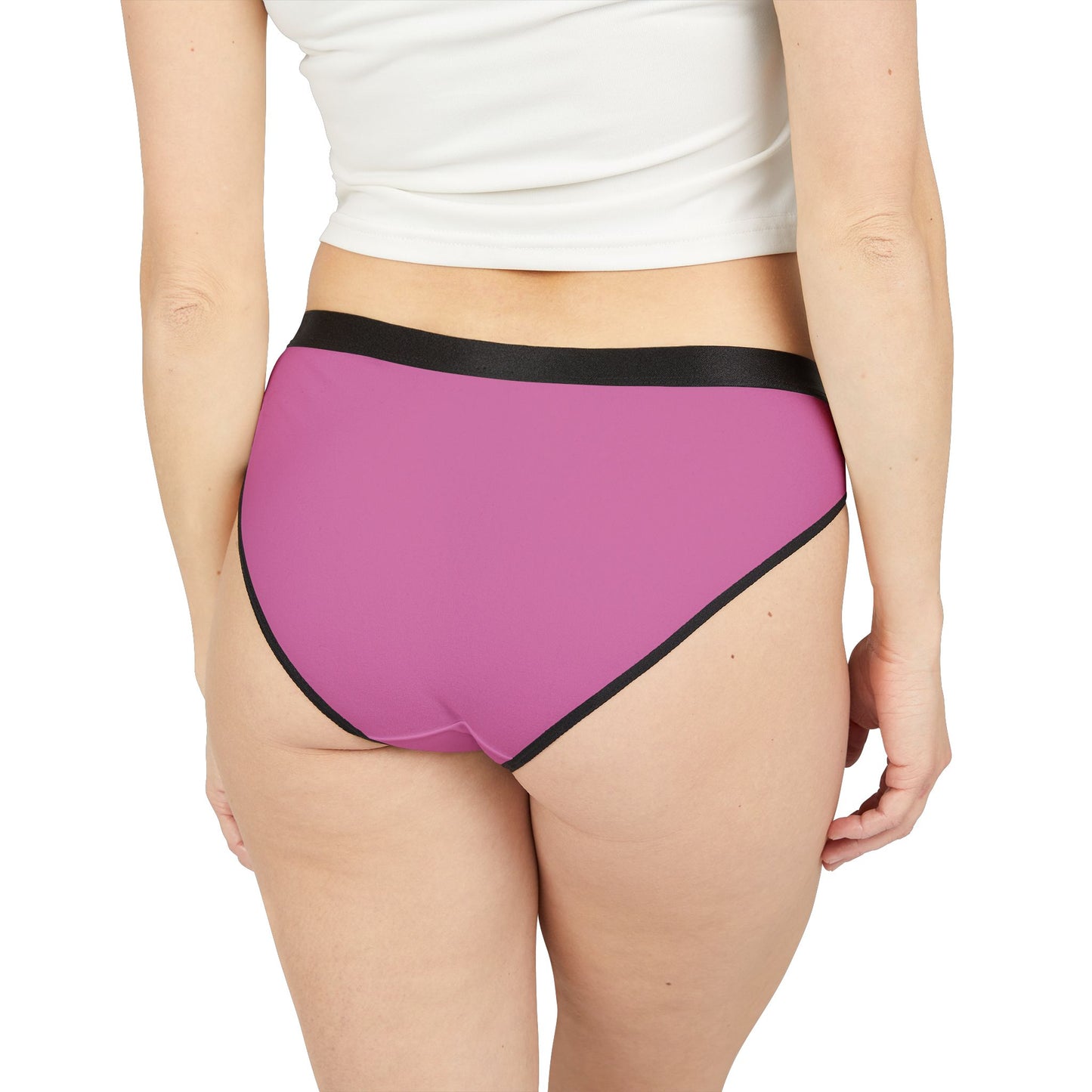 Purple underwear with black trim worn by a person on a white background