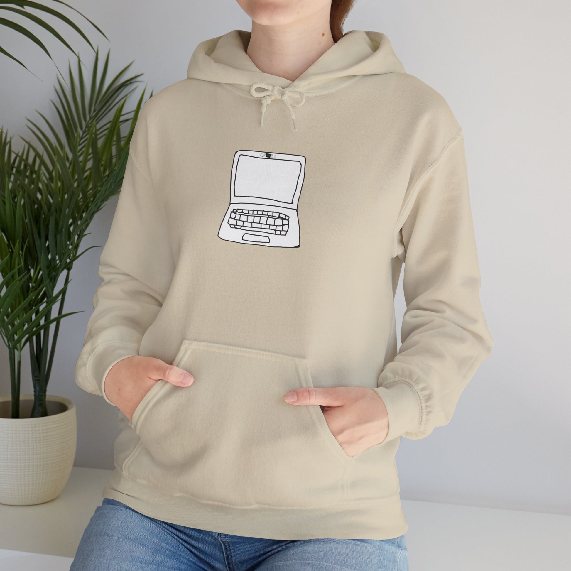Person wearing beige Unisex Laptop No Cam Hoodie indoors