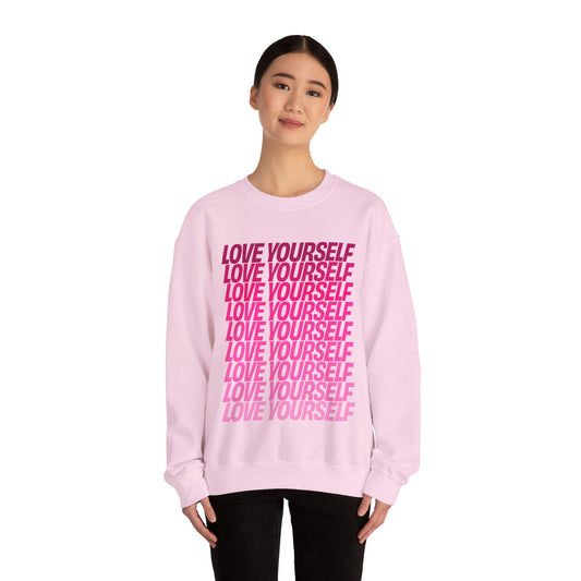 Pink Love Yourself sweatshirt worn by asian female model, front studio view