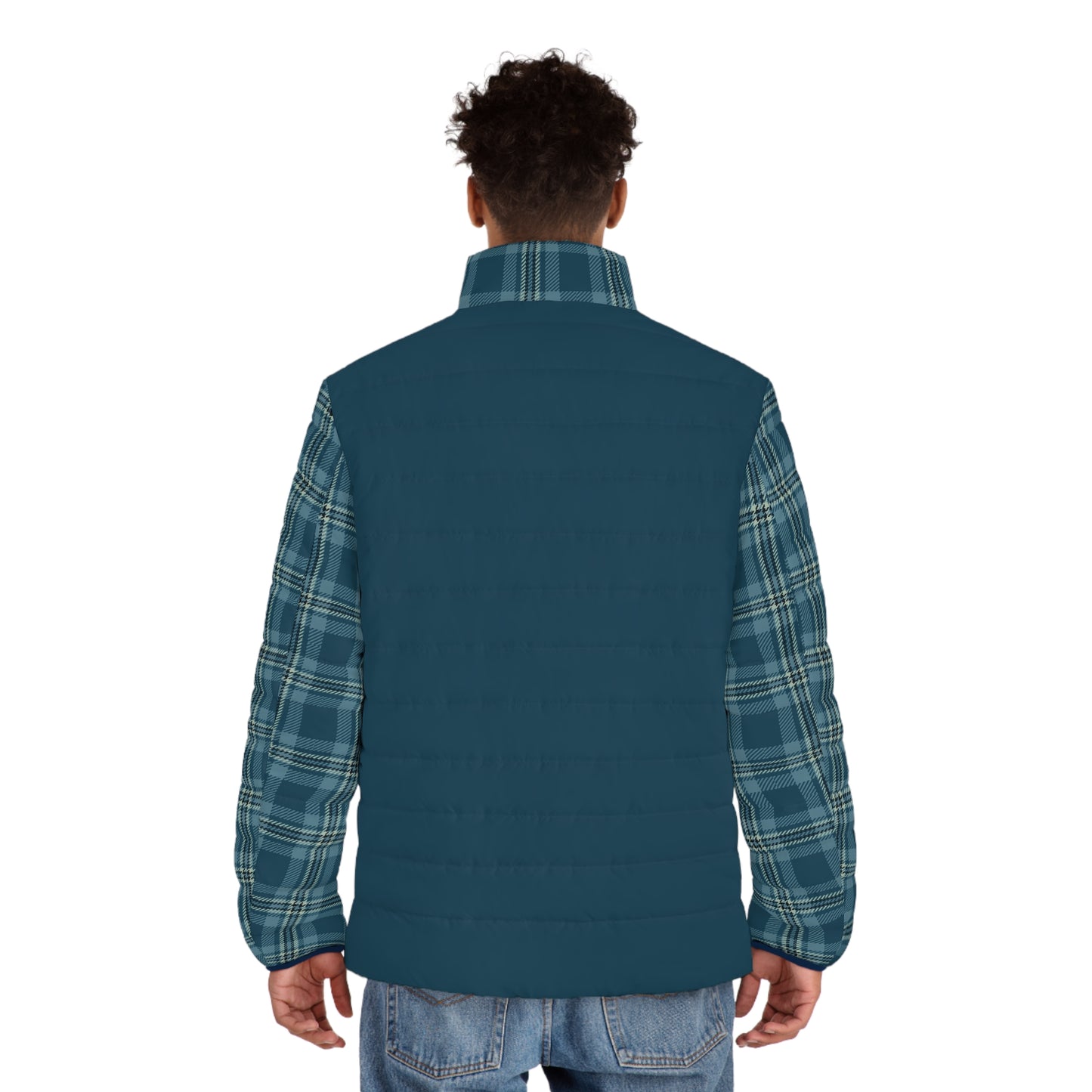 Person wearing a blue vest over a plaid shirt on a white background