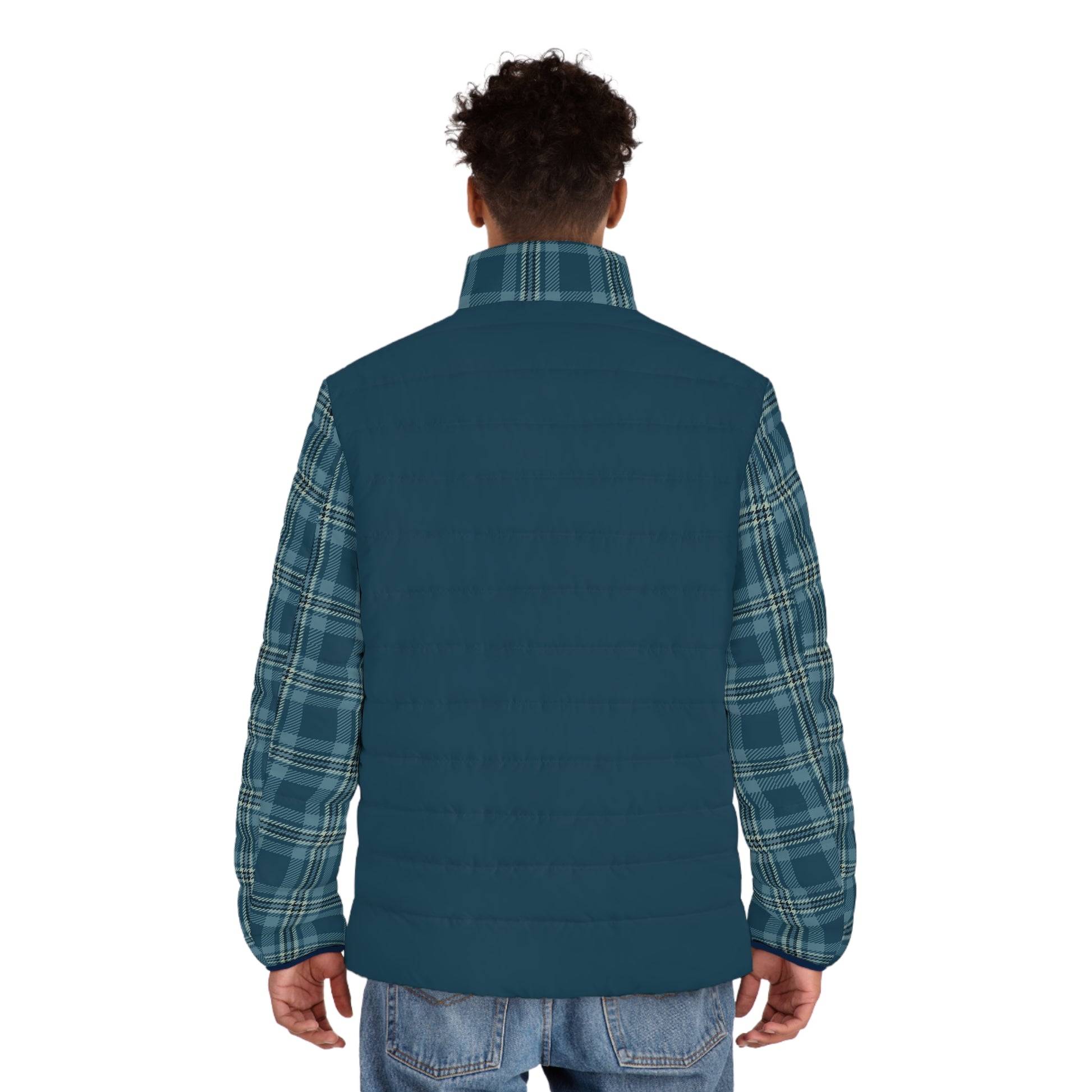 Person wearing a blue vest over a plaid shirt on a white background