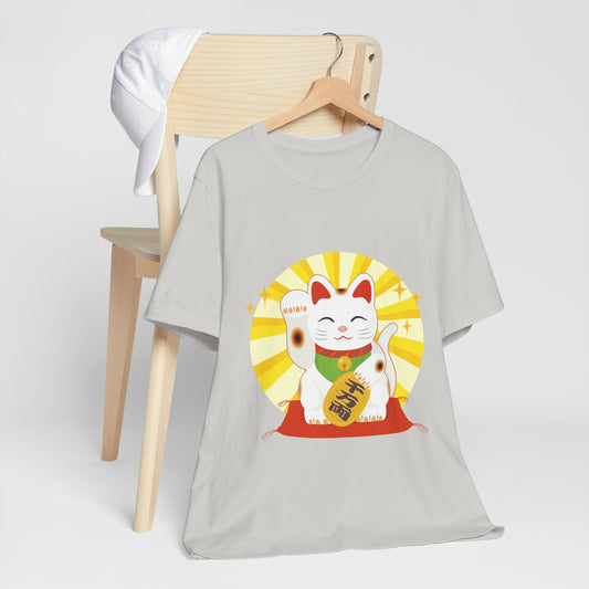Gray Maneki Neko T-Shirt draped on a chair with beckoning cat graphic