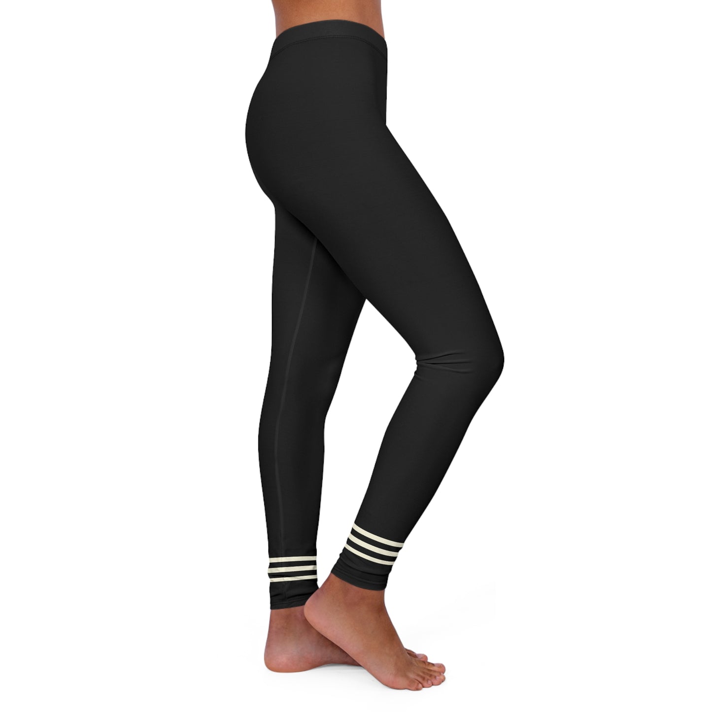 Angled side view of black leggings showing striped ankle detail.