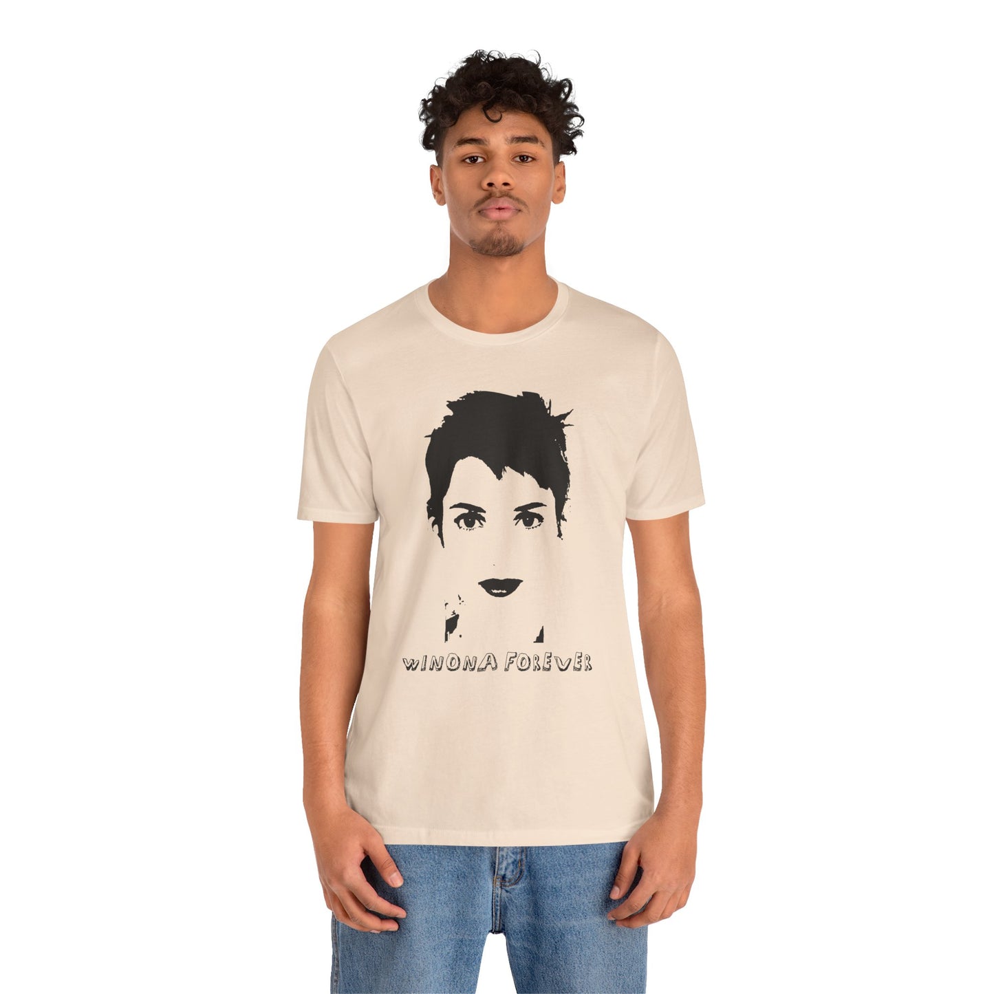 Man wearing a beige t-shirt with a graphic design and text on a white background