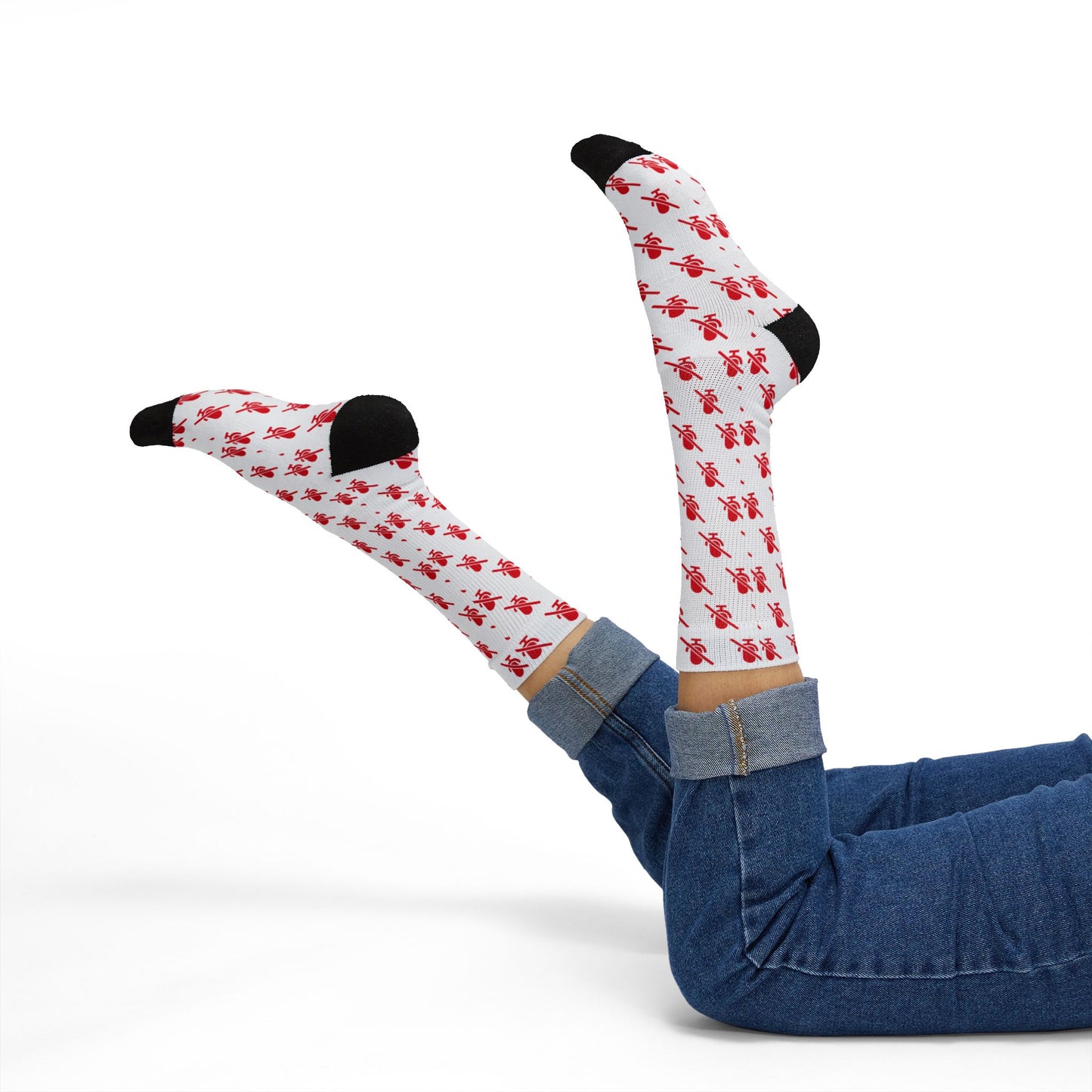 mic off crew socks white with red pattern playful legs up pose