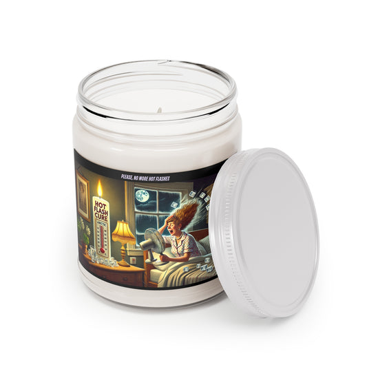 A novelty candle in a glass jar featuring retro-style artwork of a woman experiencing a hot flash at night, sitting in bed with a fan blowing, ice cubes flying through the air, and a “Hot Flash Cure” candle with a thermometer.