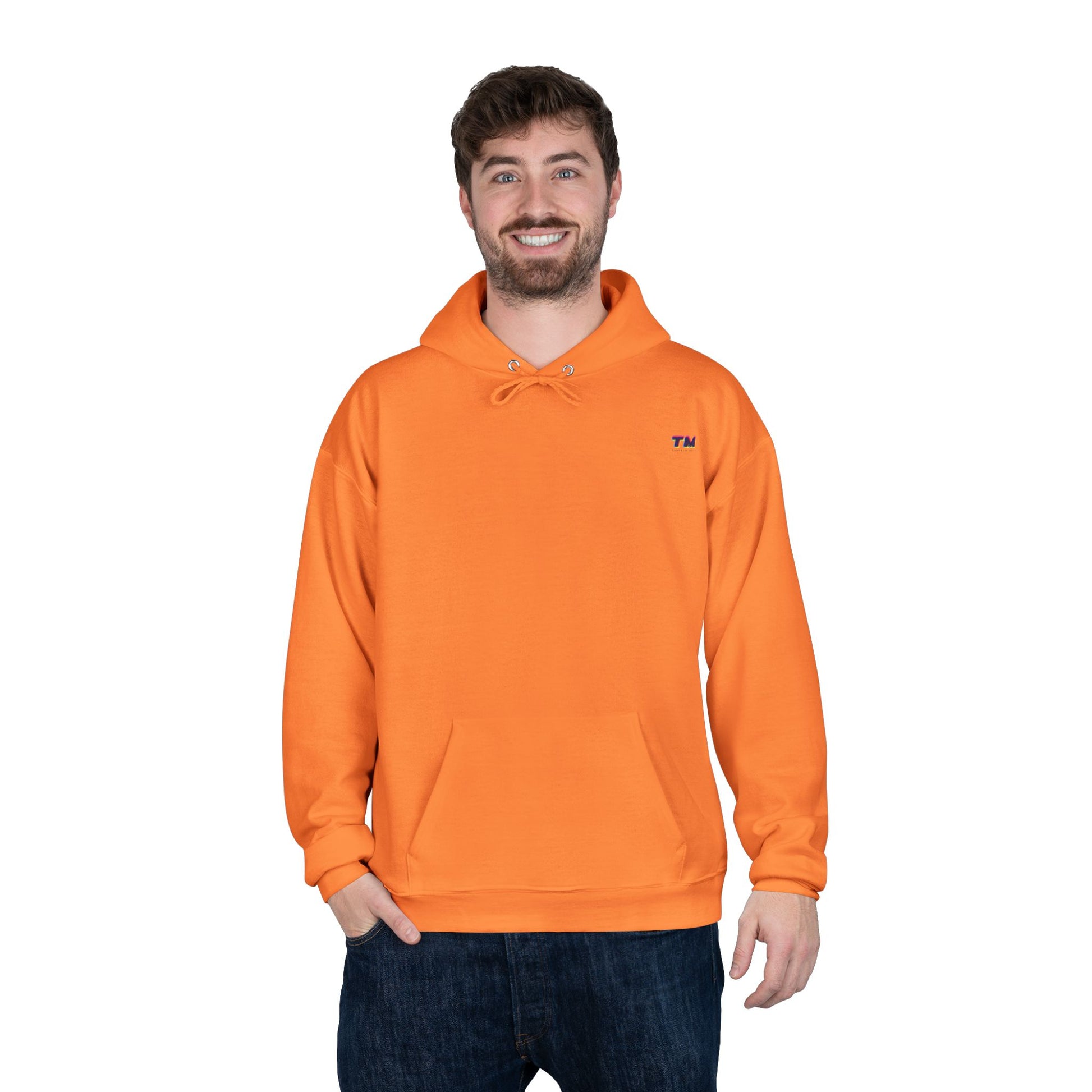 Man wearing orange EcoSmart hoodie with casual stance.