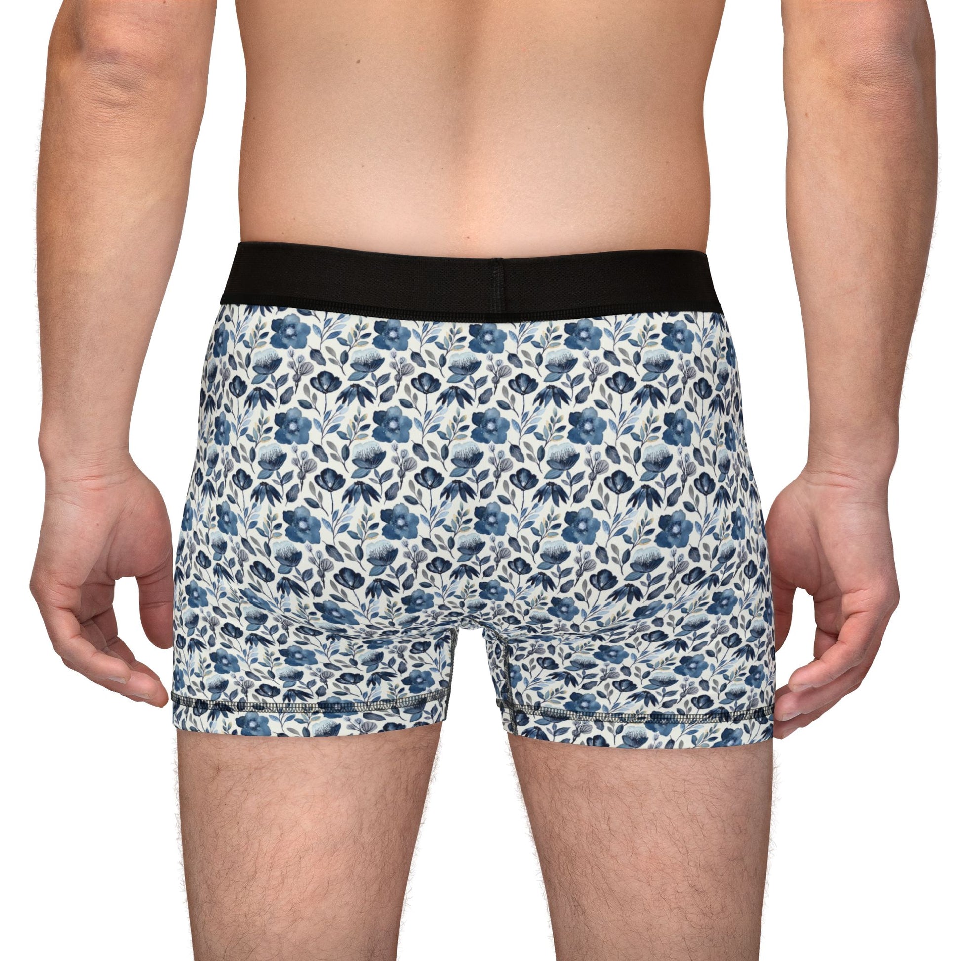 Floral-patterned boxer briefs with a black waistband on a white background
