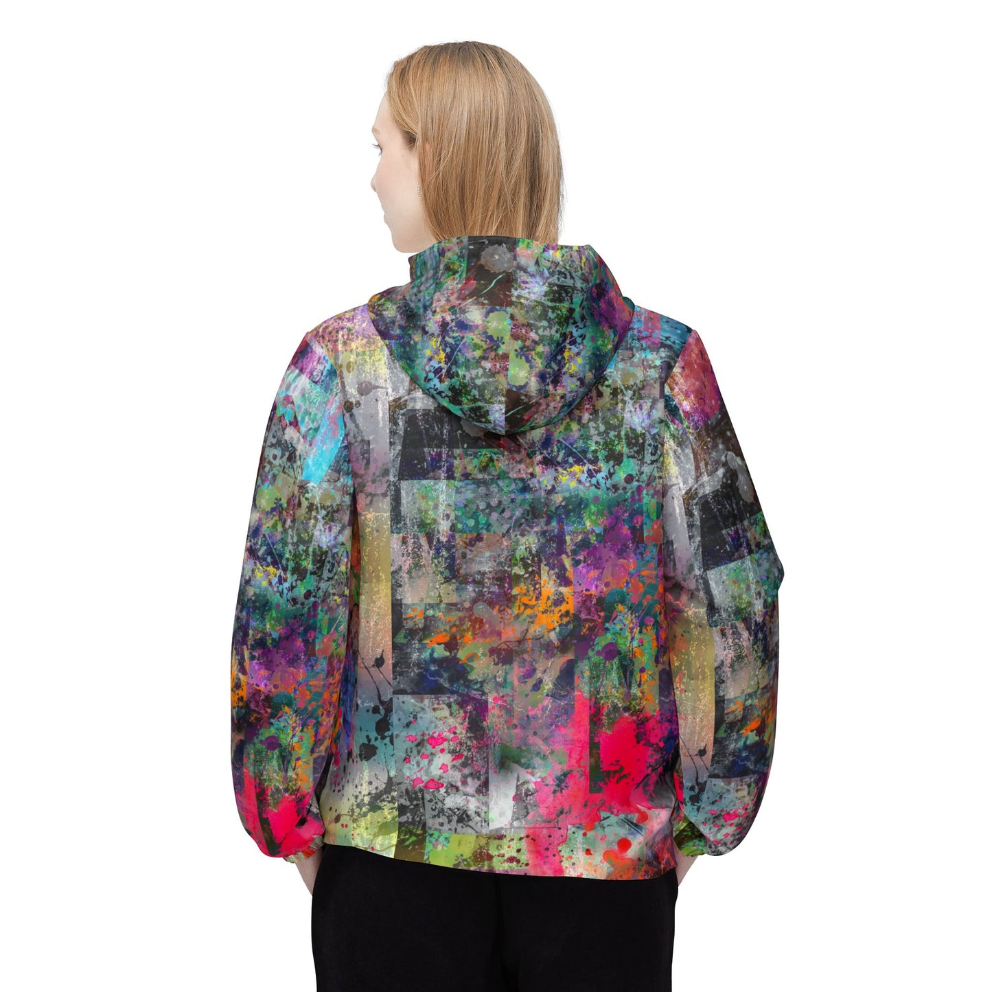 Female model back view wearing Color Splash Windbreaker Jacket with neon paint splashes.