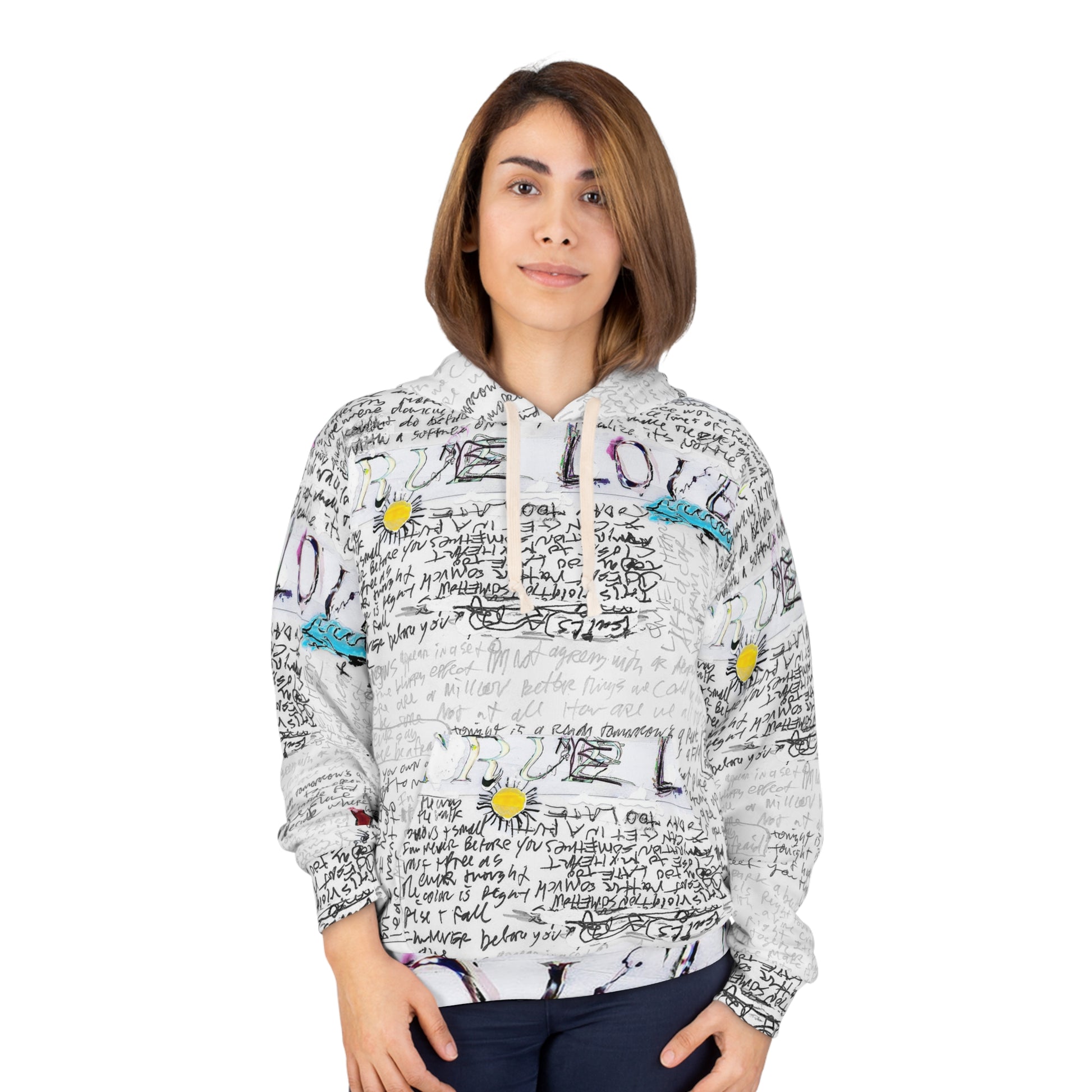 Female model wearing white unisex hoodie with handwritten text and colorful doodle design, hands in pockets