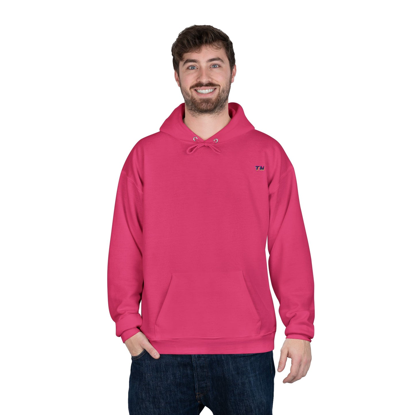 Man wearing hot pink EcoSmart hoodie with casual stance.