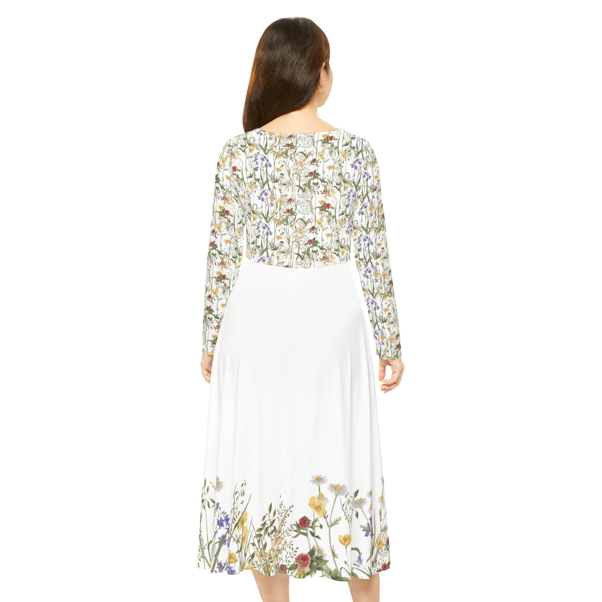 Back of a woman wearing long sleeve floral midi dress with wildflower print

