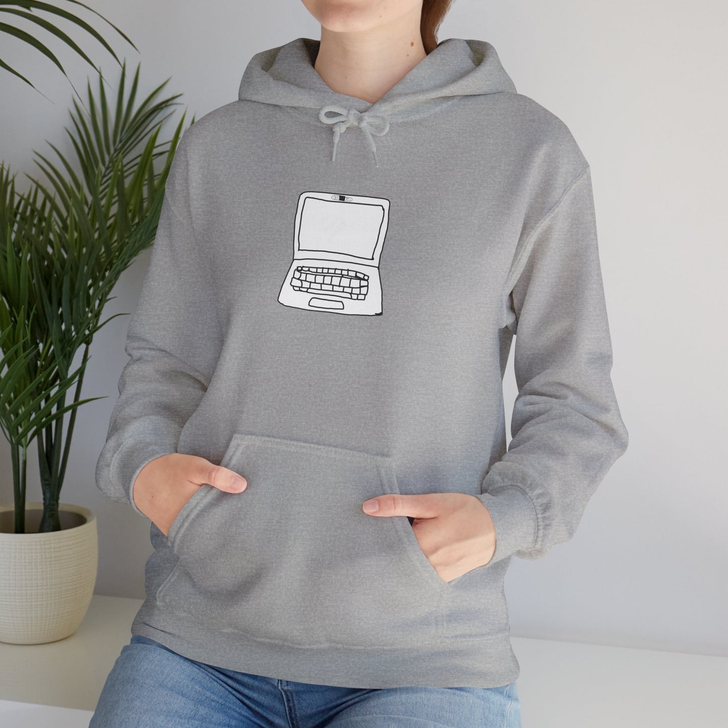 Person wearing light gray Unisex Laptop No Cam Hoodie indoors