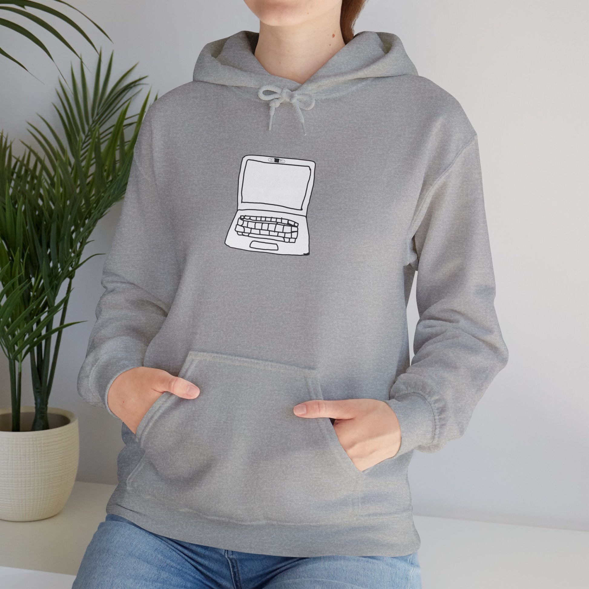 Person wearing light gray Unisex Laptop No Cam Hoodie indoors