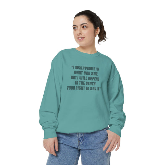 Model wearing teal Freedom of Speech sweatshirt with bold quote print