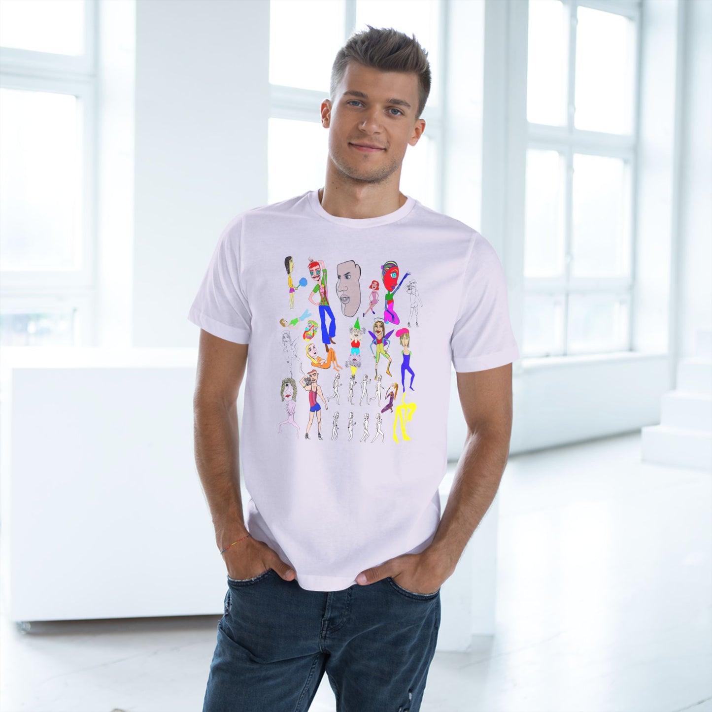 Male model wearing white Mix Unisex Deluxe T-Shirt with colorful design, hands in pockets.