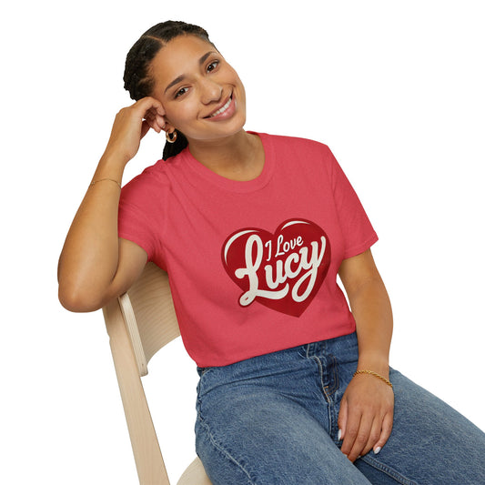 A person wearing a red crew neck t-shirt with a heart logo that has the text 'I Love Lucy' on it.