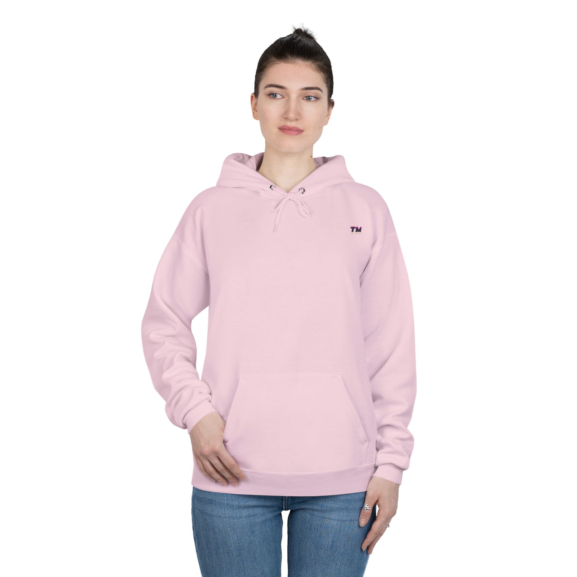 Woman wearing light pink EcoSmart hoodie with front pocket.