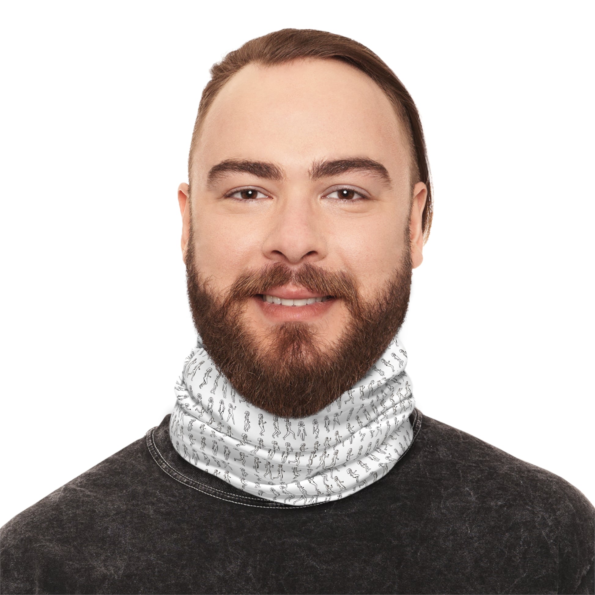 Man wearing a patterned neck gaiter on a white background