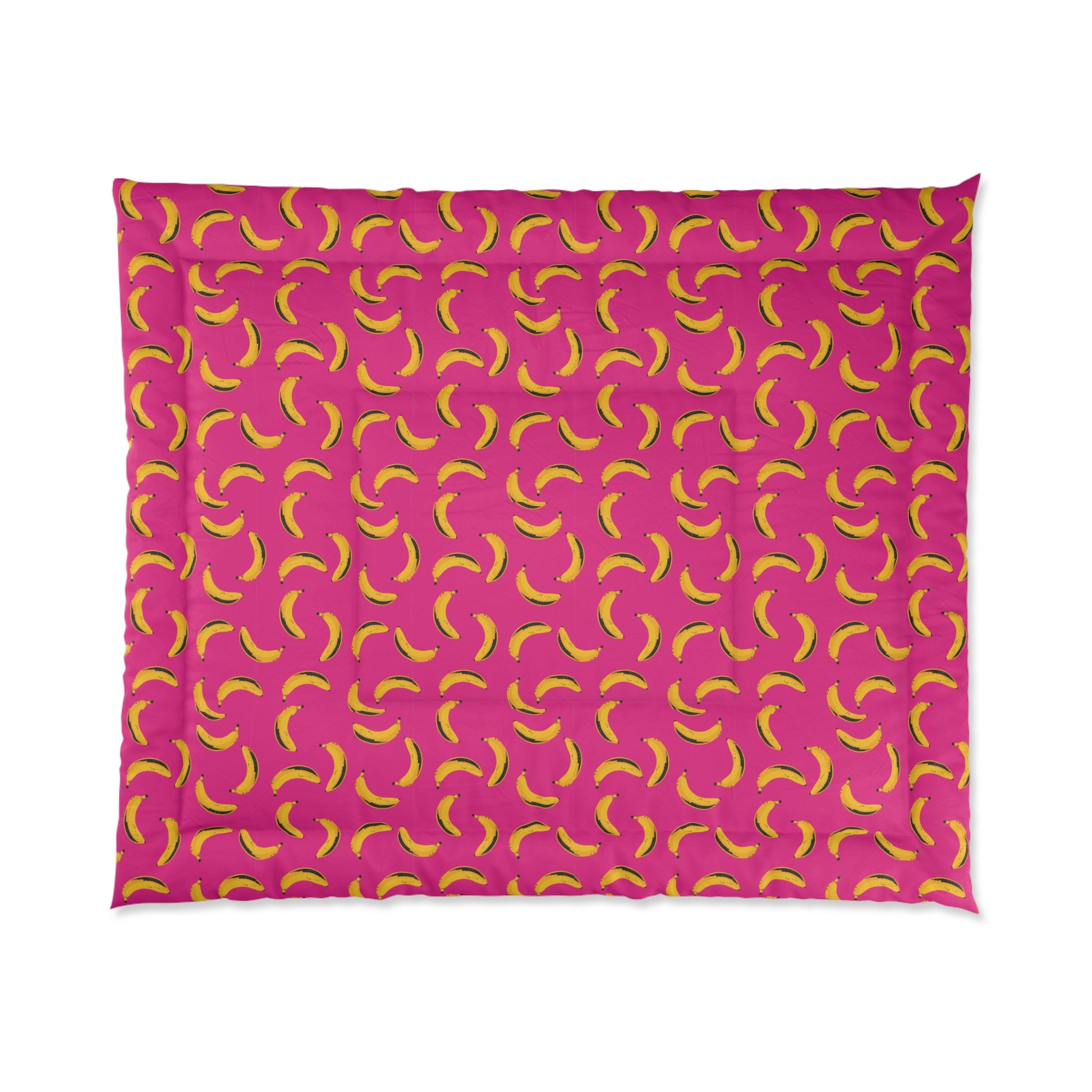 Square view of banana print comforter with pink background and yellow bananas