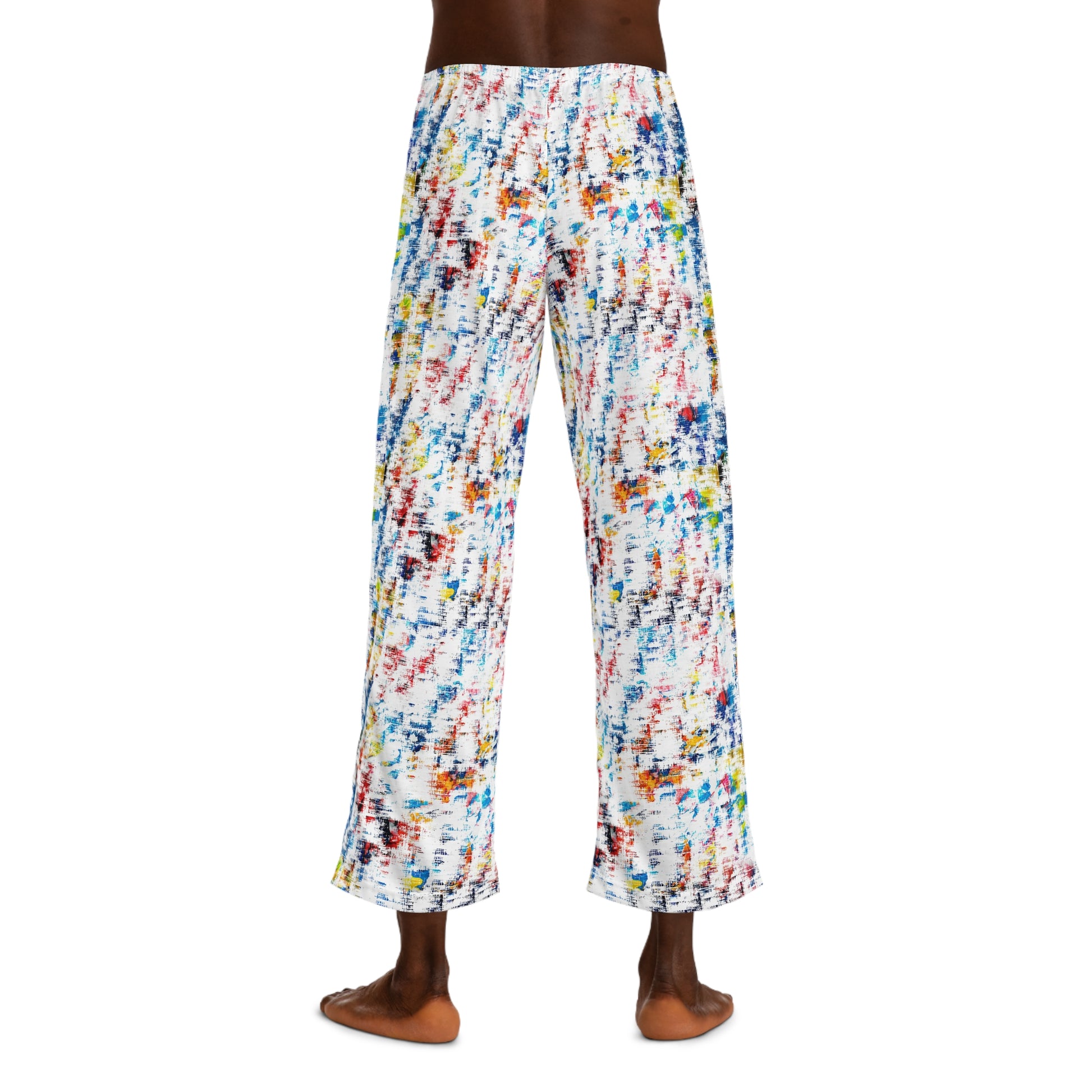 Model wearing Hip Tie Dye Men’s Pajama Pants back view showing full multicolor tie dye pattern