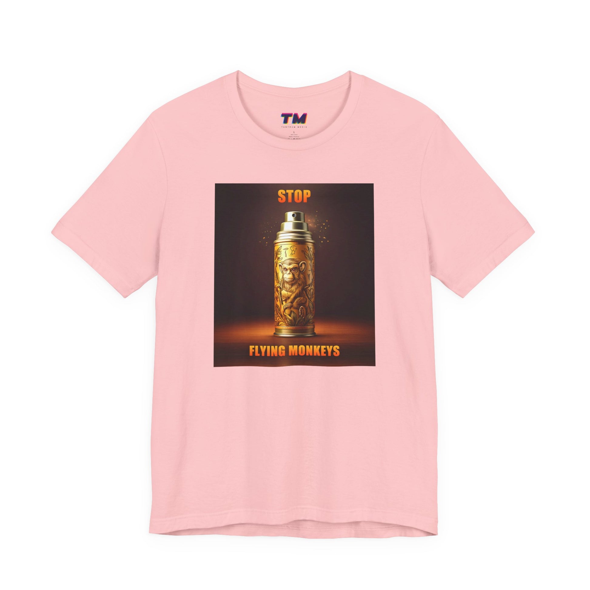 Pink Stop Flying Monkeys T-Shirt flat lay with graphic artwork