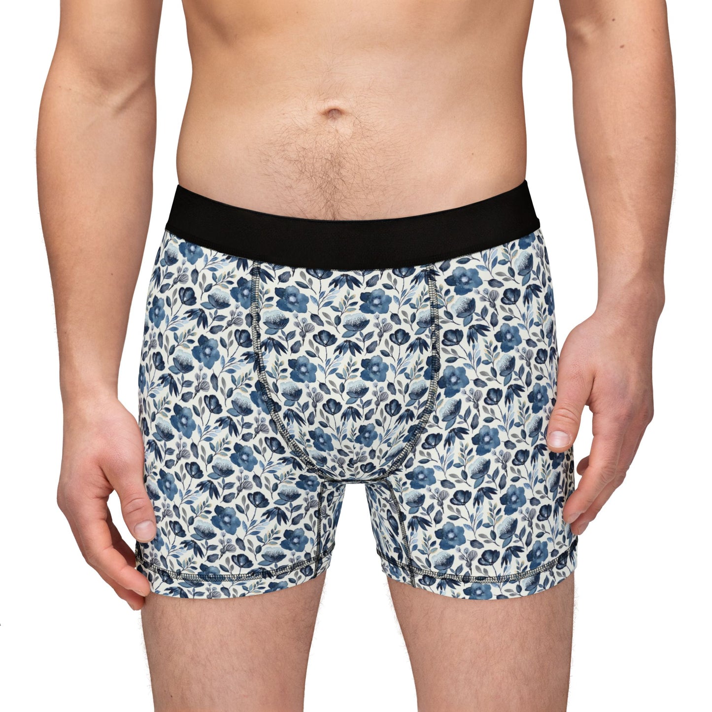 Male model front view wearing Floral Men’s Boxers with black waistband and all-over floral print