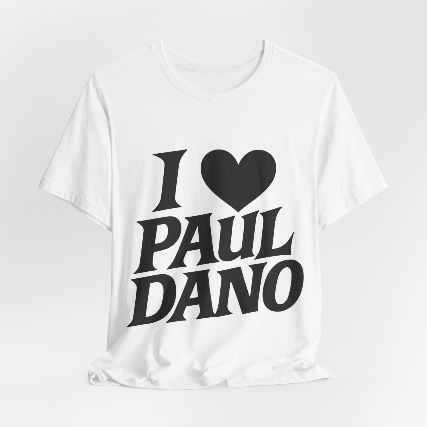 White t-shirt with 'I ❤️ Paul Dano' text on a light gray background