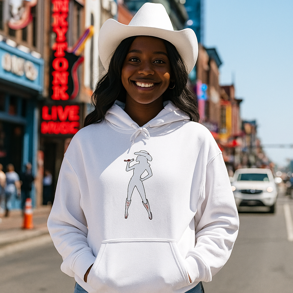 White Bey Country Hoodie on smiling model in cowboy hat on music street.