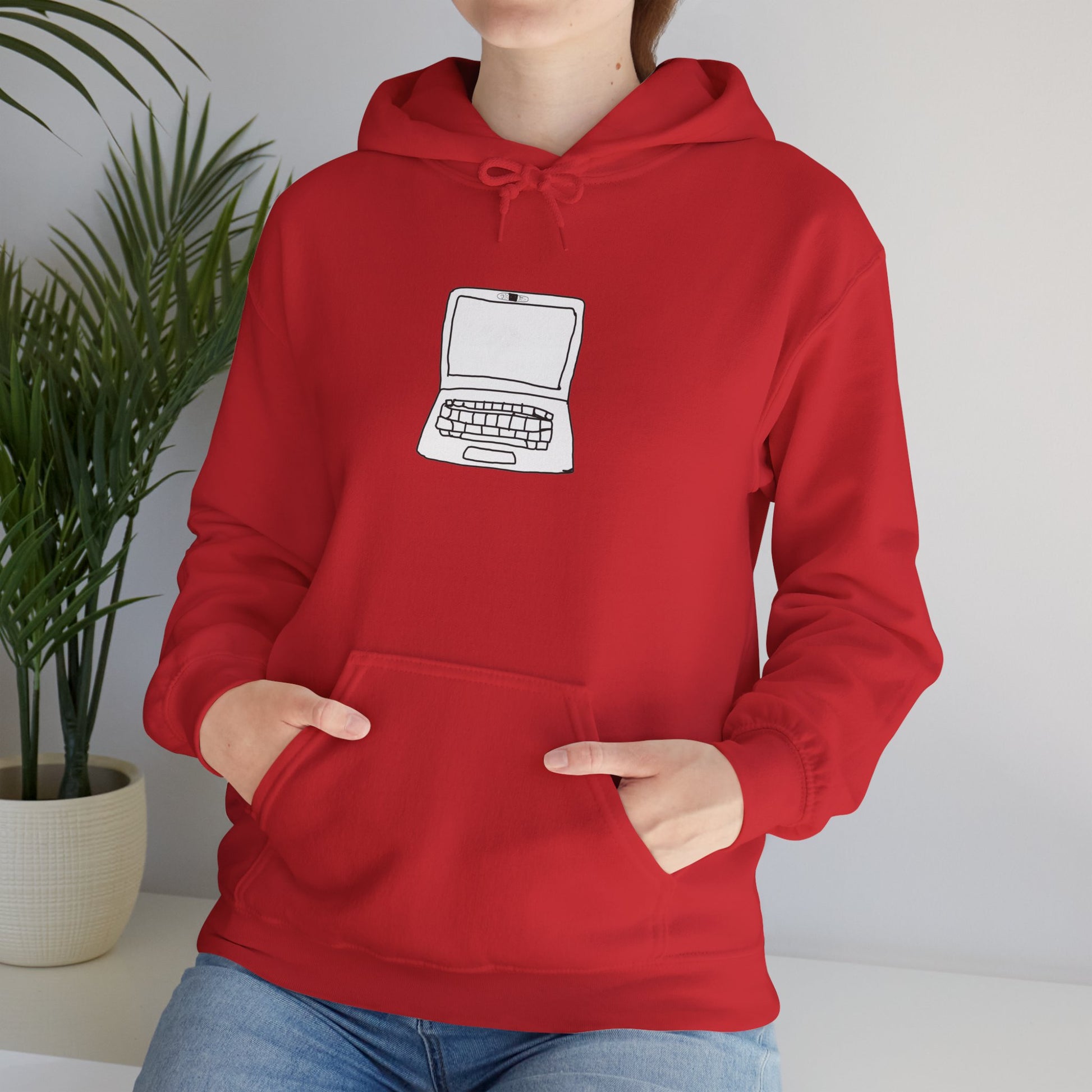 Person wearing red Unisex Laptop No Cam Hoodie indoors