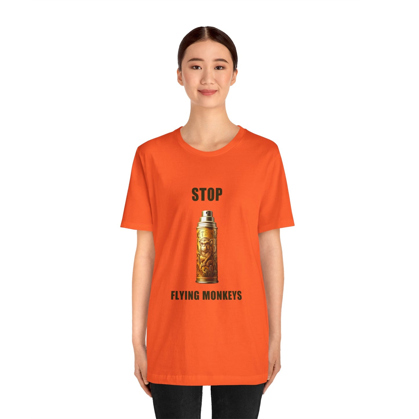 Woman wearing orange Stop Flying Monkeys T-Shirt Alternate Version front view
