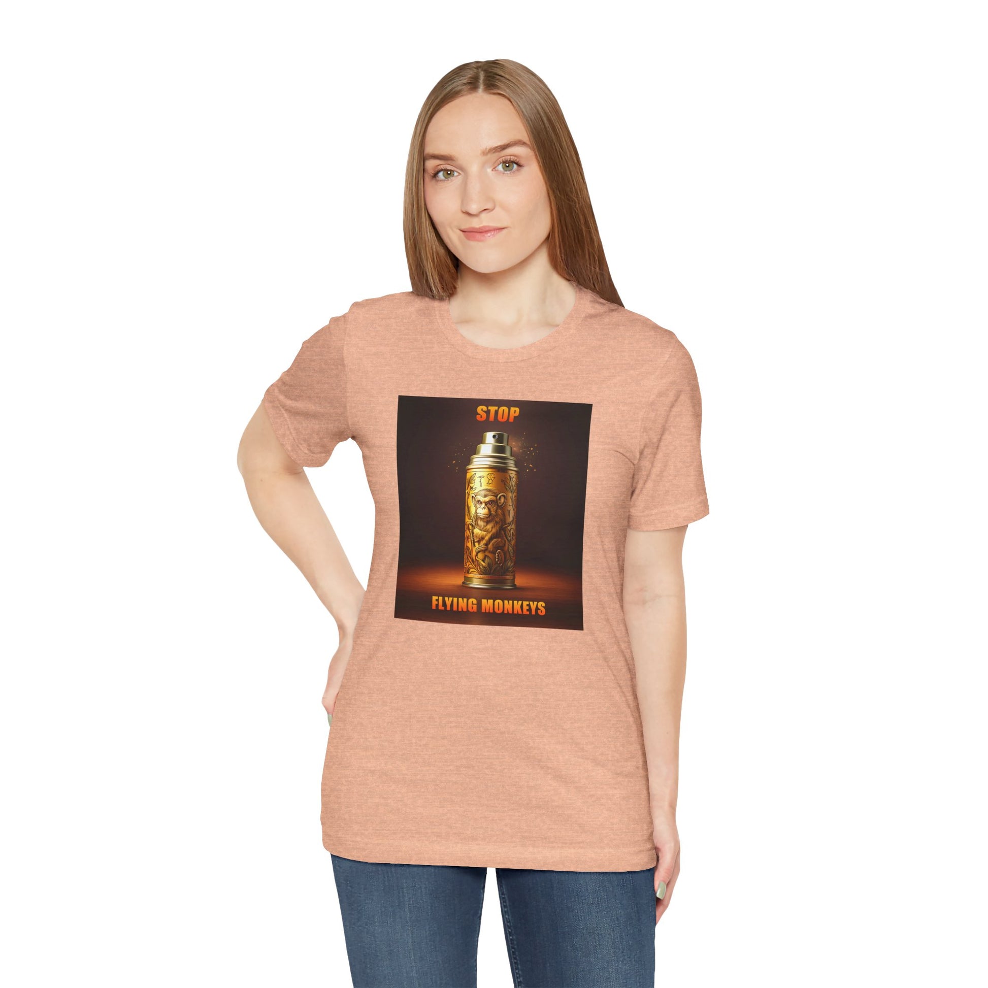 Woman wearing peach Stop Flying Monkeys T-Shirt standing confidently