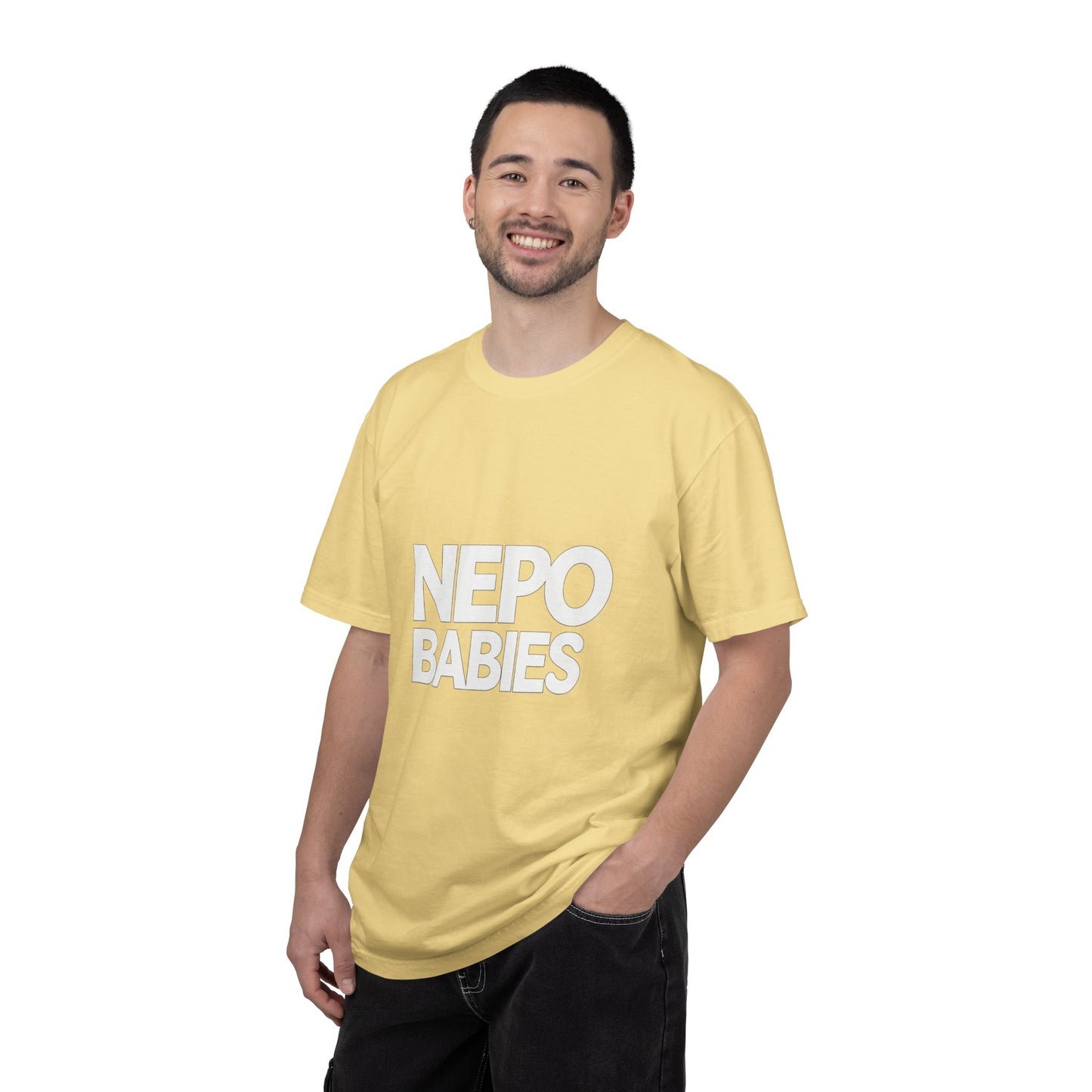 Man wearing a yellow t-shirt with 'NEPO BABIES' text on a white background