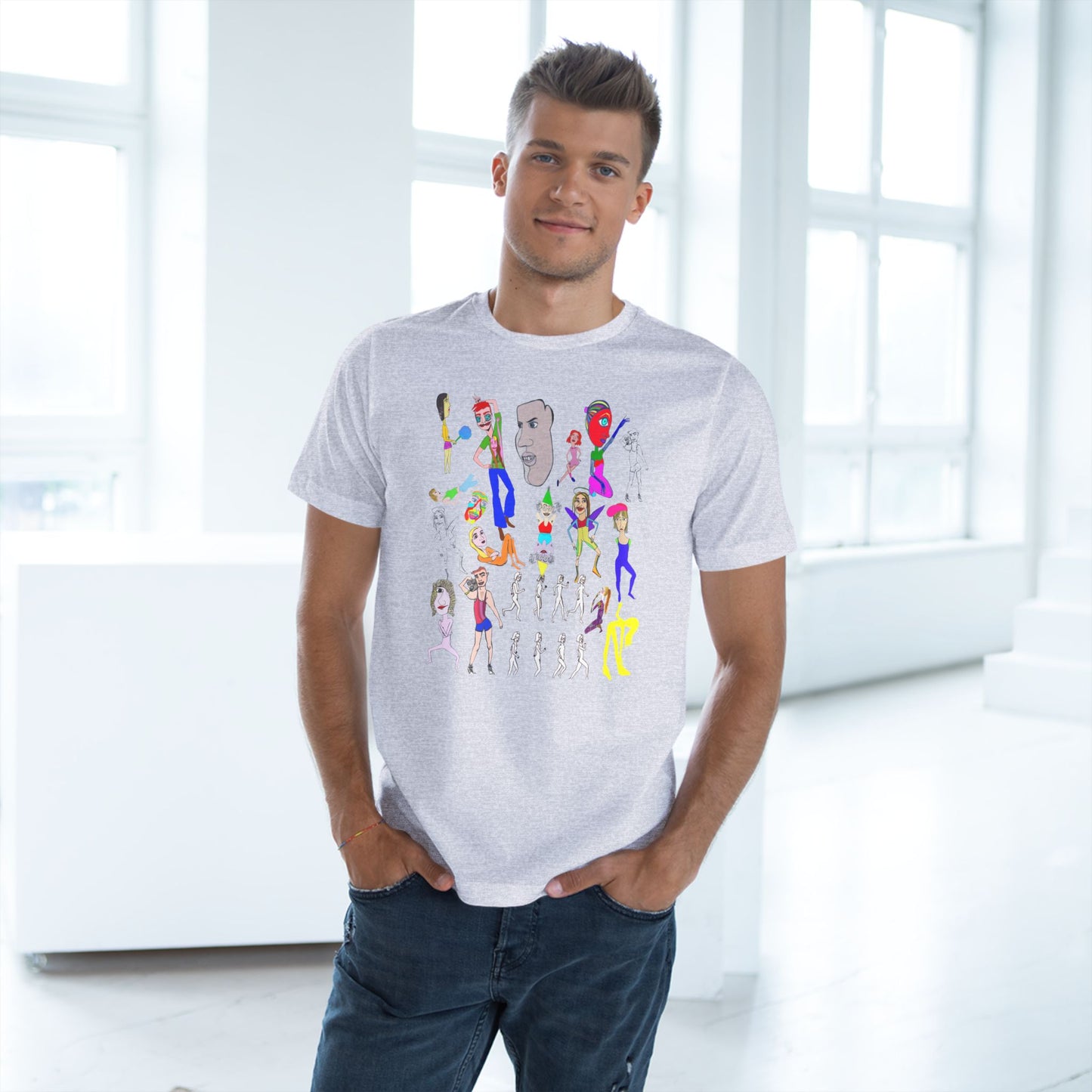 Male model wearing light gray Mix Unisex Deluxe T-Shirt with colorful hand drawn artwork.