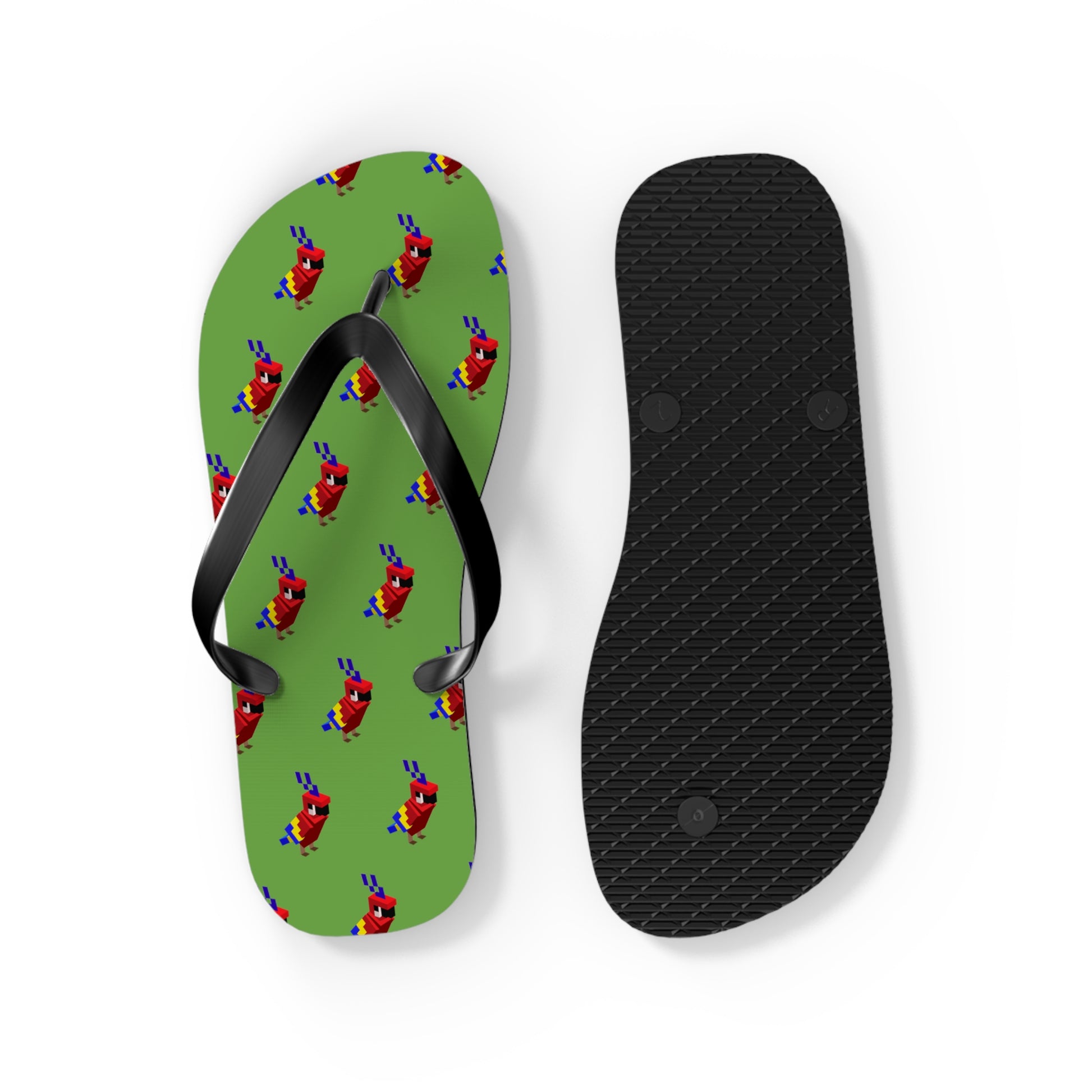 Green arcade parrot flip flops with black straps next to sole bottom showing textured grip