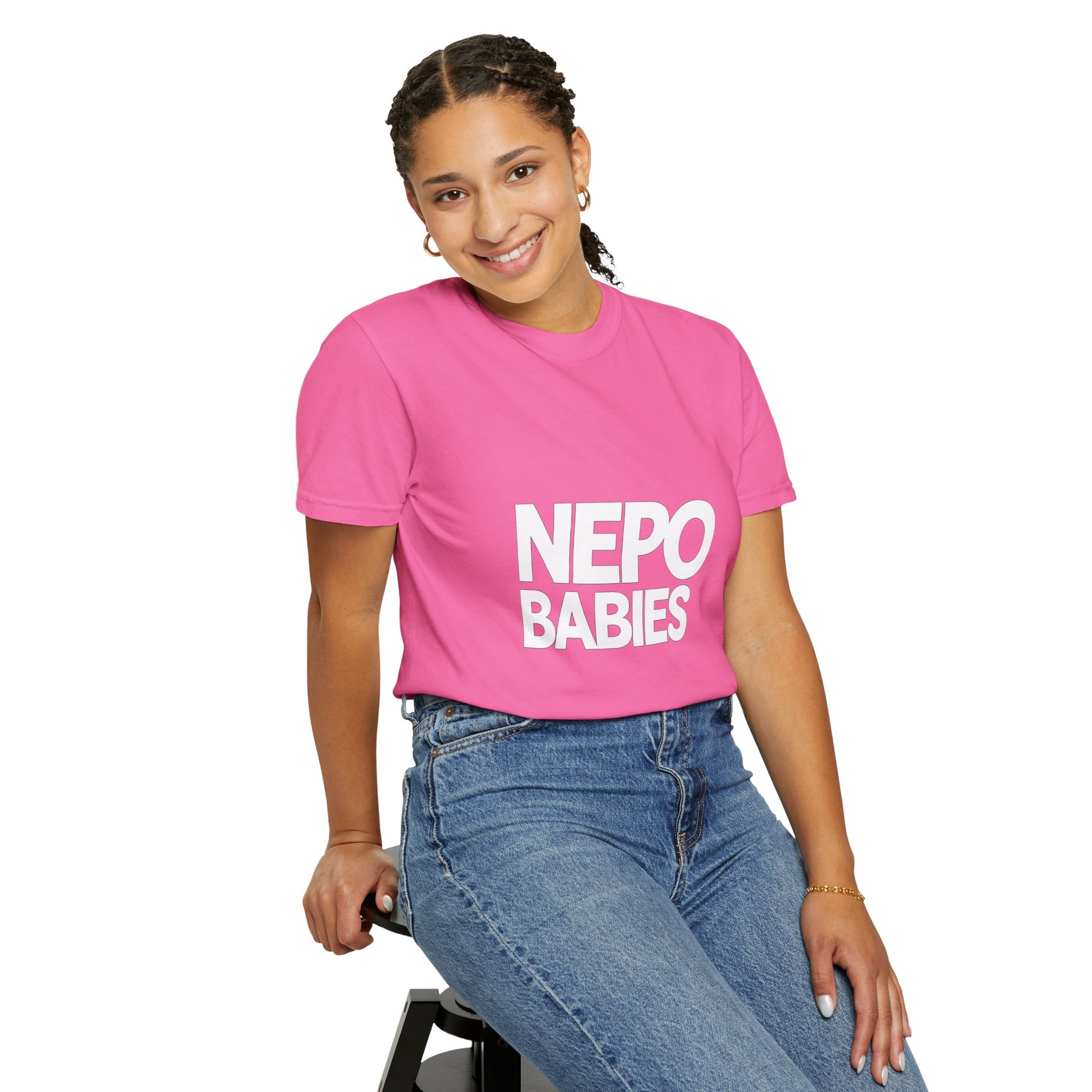 Woman wearing Nepo Babies graphic t shirt casual street style outfit