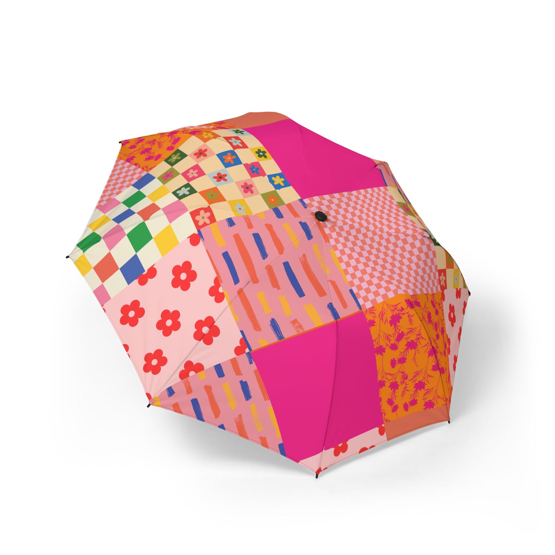 A pink patchwork-style semi-automatic umbrella with floral and checkered quilt-inspired patterns
